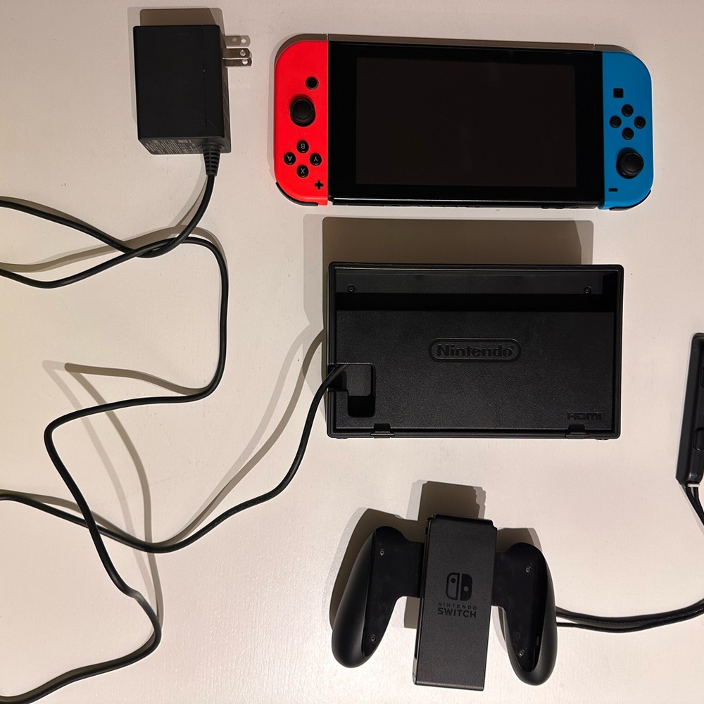 Nintendo Switch with Red and Blue Joy-Con Controllers